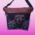 Kuikuttajat-olkalaukku, kierrätysnahkaa