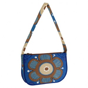 Sinisävyinen beigekukkalaukku